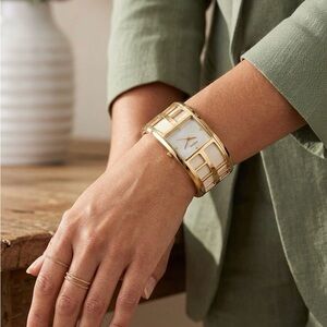 Fossil Women’s Gold and White Leather Bangle Watch